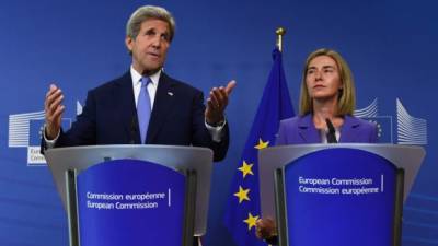 El secretario de Estado estadounidense, John Kerry, y Alta Representante de la Unión Europea (UE) para Asuntos Exteriores y Política de Seguridad, Federica Mogherini, en una conferencia de prensa conjunta tras su reunión en la sede de la UE en Bruselas. AFP