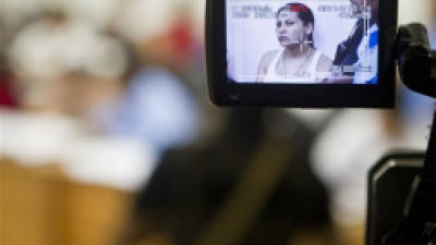 Mexican national Raquel Alatorre Correa, who is facing organized crime and money laundering charges, is filmed by a TV reporter during a court hearing, in Managua, Nicaragua, Tuesday, Sept 18, 2012. Costa Rican authorities say Alatorre is believed to be the leader of a group posing as Televisa journalists transporting millions of dollars to Costa Rica to pay for a load of drugs that had been smuggled into the United States. The Aug. 20 seizure has pulled back the curtain on Nicaraguas role as a conduit between South American cocaine producers and the Mexican drug cartels that move their product into the United States. (AP Photo/Esteban Felix)