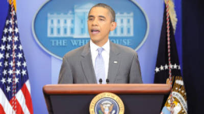 US President Barack Obama makes a statement on debt crisis at the White House in Washington, DC, on July 31, 2011. US President Barack Obama announced late Sunday that he and top lawmakers had reached an 11th-hour deal to avert a disastrous debt default that would have sown chaos in the world economy. 'I want to announce that the leaders of both parties in both chambers have reached an agreement that will reduce the deficit and avoid default, a default that would have had a devastating effect on our economy,' Obama said in hastily announced remarks at the White House. AFP Photo / Jewel Samad