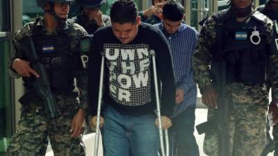 Ronald Antonio Rodríguez González cuando era llevado a la audiencia inicial en San Pedro Sula.