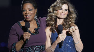 Maria Shriver appears with Oprah Winfrey during a star-studded double-taping of 'Surprise Oprah! A Farewell Spectacular,' Tuesday, May 17, 2011, in Chicago. 'The Oprah Winfrey Show' is ending its run May 25, after 25 years, and millions of her fans around the globe are waiting to see how she will close out a show that spawned a media empire. (AP Photo/Charles Rex Arbogast)