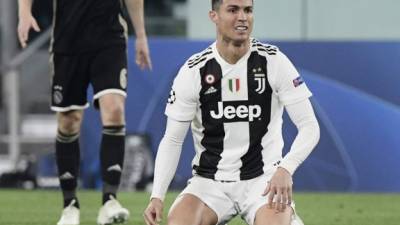 Juventus' Portuguese forward Cristiano Ronaldo reacts during the UEFA Champions League quarter-final second leg football match Juventus vs Ajax Amsterdam on April 16, 2019 at the Juventus stadium in Turin. (Photo by Filippo MONTEFORTE / AFP)