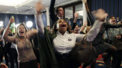 Supporters of President Barack Obama, including Tankia Inlaw, center, and Heather Alexa Woodfield, left, celebrate at New York State Democratic Headquarters following Election Day, Tuesday, Nov. 6, 2012. (AP Photo/Kathy Willens)