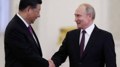 El presidente de China, Xi Jinping, con su homólogo ruso, Vladimir Putin. Foto: AFP