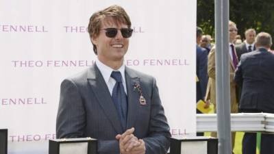 (FILES) In this file photo actor Tom Cruise makes a surprise appearance in Hall H to promote Top Gun: Maverick at the Convention Center during Comic Con in San Diego, California on July 18, 2019. - Production on the latest film in the 'Mission: Impossible' series starring Tom Cruise has been stopped in Italy following the outbreak of coronavirus cases, US media reported Monday. (Photo by Chris Delmas / AFP)