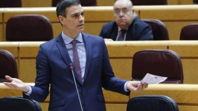 Spanish Prime Minister Pedro Sanchez speaks during the Government's question time session at the Senate in Madrid on May 5, 2020. - Spain's coalition government warned the opposition yesterday it could spark 'chaos' in the healthcare system and the economy if it failed to approve an extension of the lockdown to curb the spread of the virus. Facing increasing criticism over its handling of the crisis, the minority government of Prime Minister Pedro Sanchez will tomorrow seek parliament's approval for a fresh two-week extension of the state of emergency. (Photo by Andres BALLESTEROS / POOL / AFP)