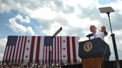 US President Barack Obama speaks on the economy in Georgetown Waterfront Park on July 1, 2014 in Washington. AFP PHOTO/Mandel NGAN