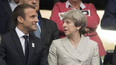 El presidente francés, Emmanuel Macron y la primera ministra británica, Theresa May. AFP/Archivo