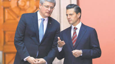 Enrique Peña Nieto con el primer ministro canadiense, Stephen Harper