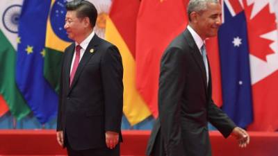 El presidente chino Xi Jinping y el mandatario estadounidense Barack Obama.