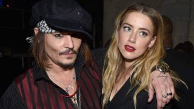 El actor Johnny Depp con su segunda esposa Amber Heard.