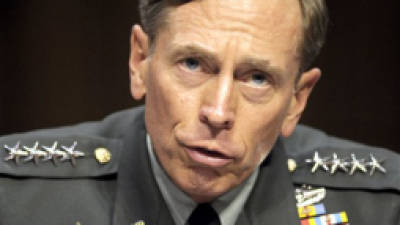 FILE - In this June 23, 2011 file photo, then-CIA Director-desigate Gen. David Petraeus testifies on Capitol Hill in Washington. Petraeus has resigned because of an extramarital affair. (AP Photo/Cliff Owen, File)