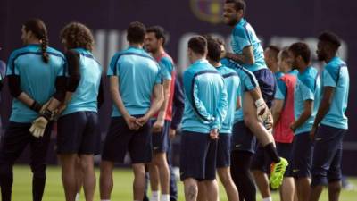 Los jugadores del Barcelona, durante el entrenamiento de este martes.