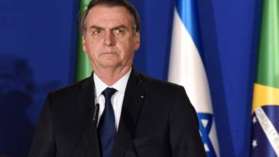 Brazilian President Jair Bolsonaro speaks during a joint press conference with the Israeli prime minister in Jerusalem on March 31, 2019. - Brazilian President Jair Bolsonaro arrived in Israel today just ahead of the country's polls in which his ally Prime Minister Benjamin Netanyahu faces a tough re-election fight. (Photo by DEBBIE HILL / POOL / AFP)