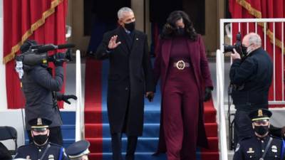 Former US President Barack Obama and former US First Lady Michelle Obama arrive for the inauguration of Joe Biden as the 46th US President on January 20, 2021, at the US Capitol in Washington, DC. (Photo by ANDREW CABALLERO-REYNOLDS / AFP)