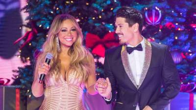 La cantante Mariah Carey y novio Bryan Tanaka.