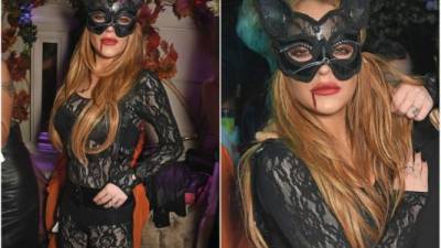 Este sábado es Halloween y las celebridades ya comenzaron a lucir sus disfraces. La actriz Lindsay Lohan apareció como una sexy gatita en Londres.