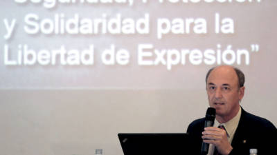 IAPA freedom of the press director Ricardo Trotti, speaks during a IAPA-sponsored event in Tegucigalpa on August 10, 2012. AFP PHOTO/Orlando SIERRA