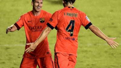 Lionel Messi e Ivan Rakitic celebran el gol del croata ante el Levante.