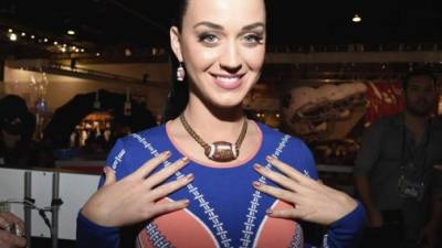 (FILES) This file photo taken on May 12, 2017 shows Katy Perry as she attends 102.7 KIIS FM's 2017 Wango Tango at StubHub Center in Carson, California. Katy Perry's songs used to delight in first-time innocence -- she kissed a girl (and she liked it), and a night of love made her feel like she was living a teenage dream.Now 32, the pop superstar has discovered adulthood. On a new album, her sound is sultry and her experiences are anything but chaste.'Witness,' which comes out June 9, 2017, marks Perry's first album since 2013 and comes after the artist largely retreated for a year following the blockbuster success of her 'Prism' album and tour. / AFP PHOTO / GETTY IMAGES NORTH AMERICA / Rich FURY
