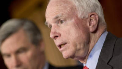 Sen. John McCain, R-Ariz., the ranking member of the Senate Armed Services Committee, joined by Sen. Sheldon Whitehouse, D-R.I., left, speaks with reporters about the situation in Syria and the Middle East, at the Capitol in Washington, Tuesday, Jan. 22, 2013. McCain and Whitehouse traveled to Egypt, Afghanistan, Jordan and Israel last week. (AP Photo/J. Scott Applewhite)