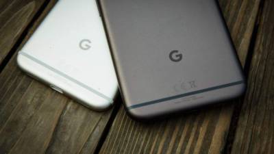 A new Google Pixel 3a phone is displayed during the Google I/O conference at Shoreline Amphitheatre in Mountain View, California on May 7, 2019. (Photo by Josh Edelson / AFP)