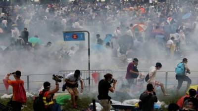 Manifestantes chinos fueron reprimidos con gases lacrimógenos durante una protesta esta mañana.