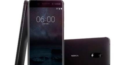 A person holds Nokia's new phone 'Nokia 6' after its presentatioin on February 26, 2017 in Barcelona on the eve of the start of the Mobile World Congress.Phone makers will seek to seduce new buyers with even smarter Internet-connected watches and other wireless gadgets as they wrestle for dominance at the world's biggest mobile fair starting tomorrow. / AFP PHOTO / Josep Lago