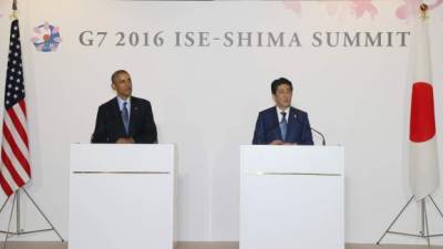 Barack Obama junto al primer ministro japonés Shinzo Abe. AFP