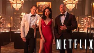 Los actores Ryan Reynolds, Gal Gadot y Dwayne Johnson.