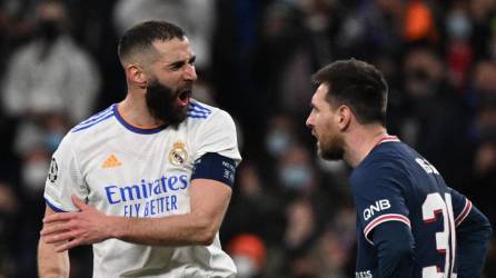 Karim Benzema eliminó al PSG de Messi de la Champions League tras marcar un hat-trick en el Santiago Bernabéu. Foto AFP.