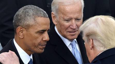 El expresidente Barack Obama, Donald Trump y Joe Biden. AFP