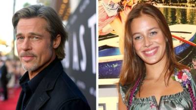 El actor estadounidense Brad Pitt y la modelo alemana Nicole Poturalski.