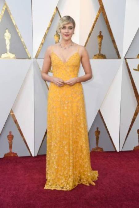 Greta Gerwig, director de 'Lady Bird',apostó por este lindo vestido color amarillo de Rodar.