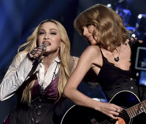 LOS ANGELES, CA - MARCH 29: Singers Madonna (L) and Taylor Swift perform 'Ghost Town' onstage during the 2015 iHeartRadio Music Awards which broadcasted live on NBC from The Shrine Auditorium on March 29, 2015 in Los Angeles, California. (Photo by Kevin Winter/Getty Images for iHeartMedia)