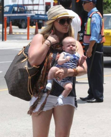 Exclusive: Actress Hilary Duff, her son Luca, her sister Haylie and their mother Susan arriving at the airport to catch a flight back to Los Angeles in Cabo San Lucas, Mexico on June 28, 2012.