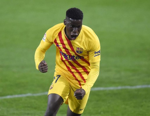 Barcelona's Spanish midfielder Ilaix Moriba celebrates after scoring during the Spanish League football match between CA Osasuna and FC Barcelona at El Sadar stadium in Pamplona on March 6, 2021. (Photo by ANDER GILLENEA / AFP)