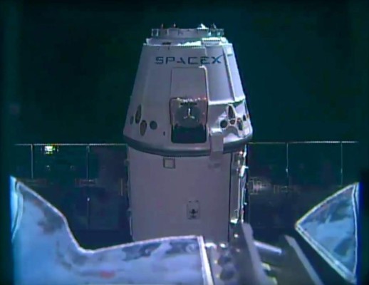 In this still image taken from NASA TV, NASA astronauts Bob Behnken (rear) and Doug Hurley are strapped in the SpaceX Crew Dragon capsule at Kennedy Space Center in Florida for their launch to the International Space Station on May 30, 2020. (Photo by - / various sources / AFP) / RESTRICTED TO EDITORIAL USE - MANDATORY CREDIT 'AFP PHOTO / NASA TV' - NO MARKETING - NO ADVERTISING CAMPAIGNS - DISTRIBUTED AS A SERVICE TO CLIENTS