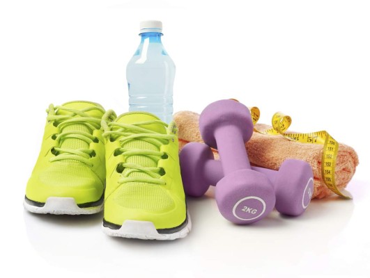 Dumbbells, water bottle, running shoes, tape measure and towel isolated on white