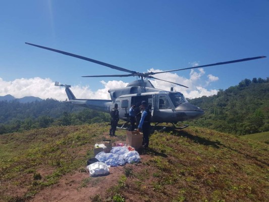 Honduras: Casa por casa llevan las raciones de alimentos