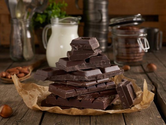 Rustic homemade chocolate and ingredients