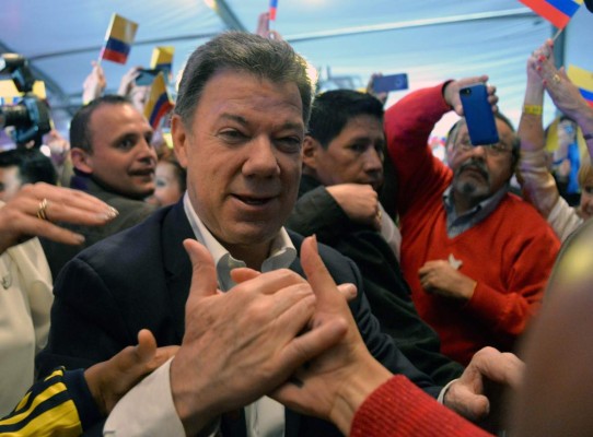 Colombia retoma camino de la paz con la reelección de Santos