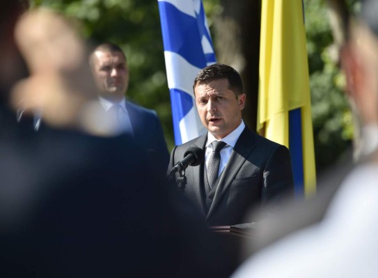 Ukrainian President Volodymyr Zelensky delivers a speech at The Babyn Yar Holocaust Memorial Centre, a place of a mass execution of Jews by Nazis in World War II, during a memorial ceremony in Kiev on August 19, 2019. - Some 34,000 Jews were murdered over two days in September 1941 at Babiy Yar, a ravine in Kiev rendering it a symbol of the Holocaust where Nazis shot more than 100,000 people (Photo by Genya SAVILOV / AFP)