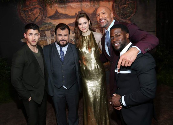 HOLLYWOOD, CA - DECEMBER 11: (L-R) Nick Jonas, Jack Black, Karen Gillan, Dwayne Johnson, and Kevin Hart attend the premiere of Columbia Pictures' 'Jumanji: Welcome To The Jungle' on December 11, 2017 in Hollywood, California. Phillip Faraone/Getty Images/AFP