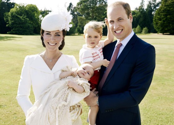KING'S LYNN, ENGLAND - JULY 05: (EDITORIAL USE ONLY) In this handout image supplied by Mario Testino/ Art Partner, Catherine, Duchess of Cambridge, Prince William, Duke of Cambridge and their children Princess Charlotte of Cambridge and Prince George of Cambridge pose for a photo after the christening of Princess Charlotte of Cambridge at the Sandringham Estate on July 5, 2015 in King's Lynn, England. (Photo by Mario Testino/ Art Partner via Getty Images)***Terms of release, which must be included and passed-on to anyone to whom this image is supplied: USE AFTER 10/10/2015 must be cleared by Art Partner. This photograph is for editorial use only. NO commercial use. NO use in calendars, books or supplements. Use on a cover, or for any other purpose, will require approval from Art Partner and the Kensington Palace Press Office. There is no charge for the supply, release or publication of this official photograph. This photograph must not be digitally enhanced, manipulated or modified and must be used substantially uncropped. Picture must be credited: copyright Mario Testino /Art Partner.***