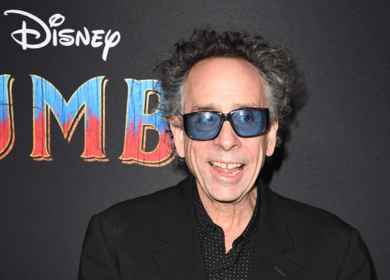 (FILES) In this file photo taken on March 11, 2019 US director Tim Burton arrives for the world premiere of Disney's 'Dumbo' at El Capitan theatre in Hollywood. - He has never liked the Big Top, mainly due to the caged animals and freaky clowns, but for legendary director Tim Burton there is no denying the romance of running away to join the circus. (Photo by Robyn Beck / AFP)
