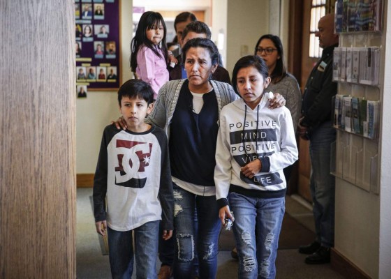 DENVER, CO - FEBRUARY 15: Undocumented immigrant and activist Jeanette Vizguerra, 45, walks into press conference with two of her children Roberto, 10, and Luna Baez, 12, before addressing supporters and the media while seeking sanctuary at First Unitarian Church on February 15, 2017 in Denver, Colorado. Vizguerra, who has been working the United States for some 20 years, and her children will be living in a room in the basement of the church hoping to avoid deportation after the local office of Immigration and Customs Enforcement denied a stay of her case which would lead to her immediate deportation. Marc Piscotty/Getty Images/AFP== FOR NEWSPAPERS, INTERNET, TELCOS & TELEVISION USE ONLY ==