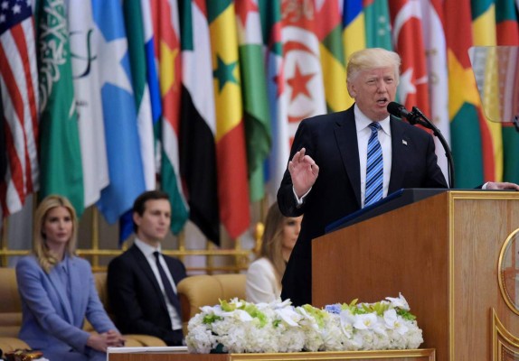 US President Donald Trump speaks during the Arab Islamic American Summit at the King Abdulaziz Conference Center in Riyadh on May 21, 2017.Trump tells Muslim leaders he brings message of 'friendship, hope and love' / AFP PHOTO / MANDEL NGAN