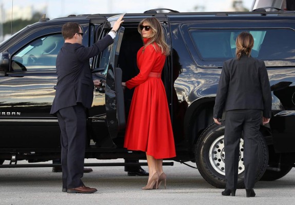 WEST PALM BEACH, FL - MARCH 17: President Donald Trump's wife Melania Trump prepares to get into a vehicle after arriving on Air Force One at the Palm Beach International Airport to spend part of the weekend at Mar-a-Lago resort on March 17, 2017 in West Palm Beach, Florida. President Trump has made numerous trips to his Florida home since the inauguration. Joe Raedle/Getty Images/AFP