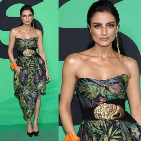 Aislinn Derbez lució espectacular con un vestido colorido y un fajón en la cintura.